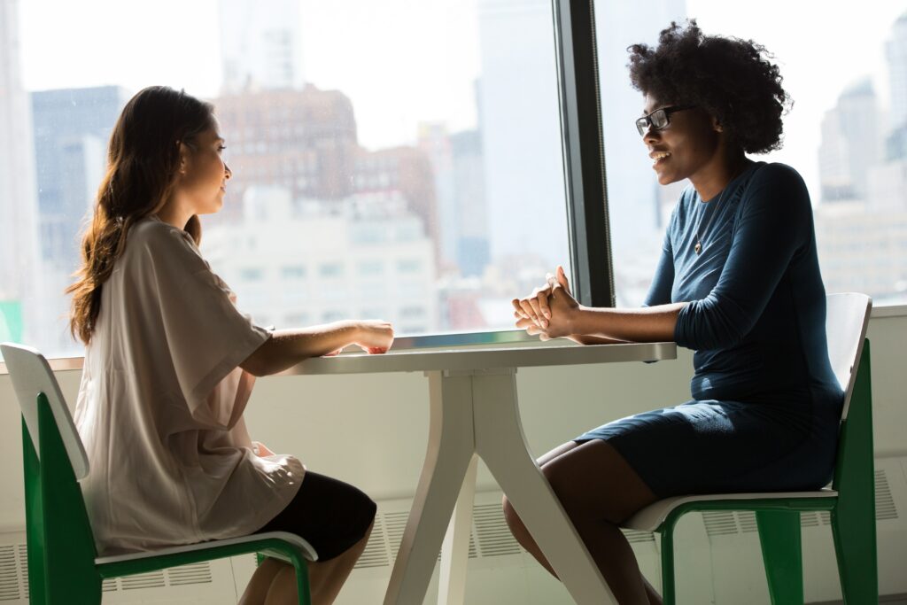 an image of two women in a therapy session