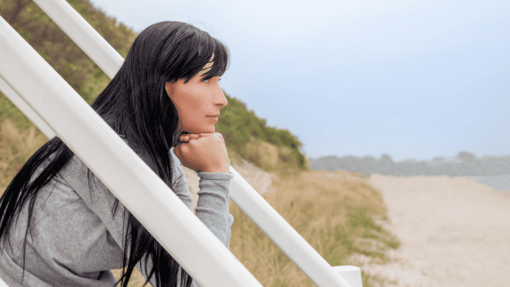 A woman thinking about the benefits of sobriety