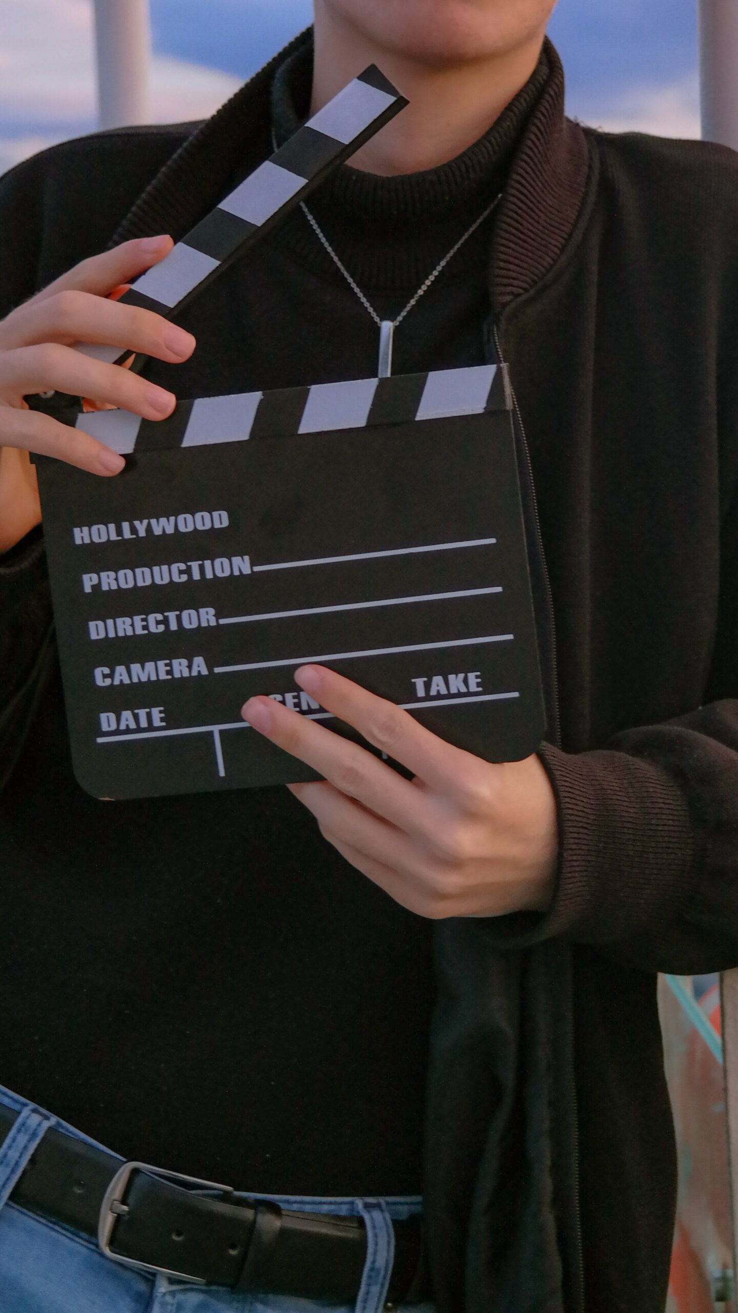 A film clapperboard, depicting Chris farley movies and the addiction he struggled with