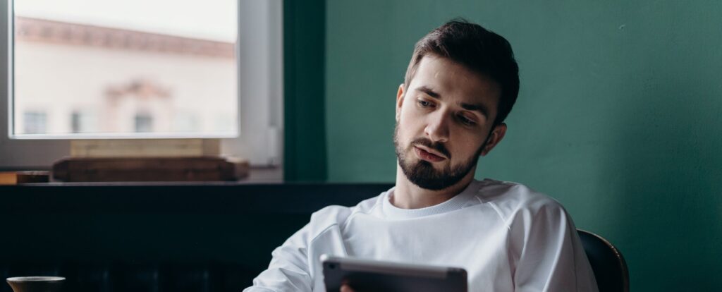 A man sitting at home in thought about the benefits of same day rehab