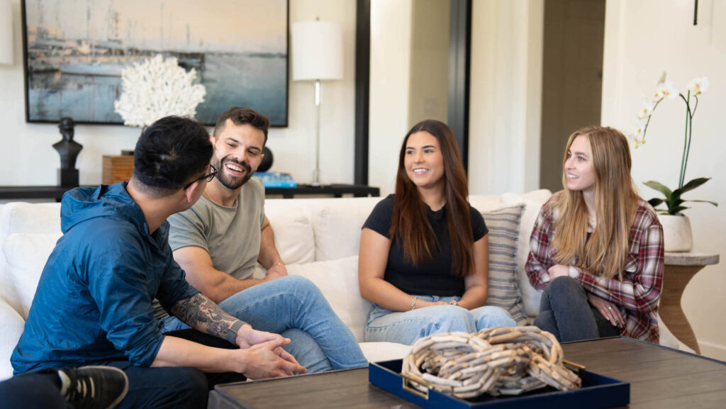 Gratitude Lodge clients laughing, representing dopamine and addiction treatment